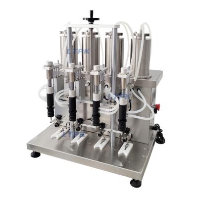 LTPK LT-VPF4 Semi-automatic four head vacuum perfume filling machine